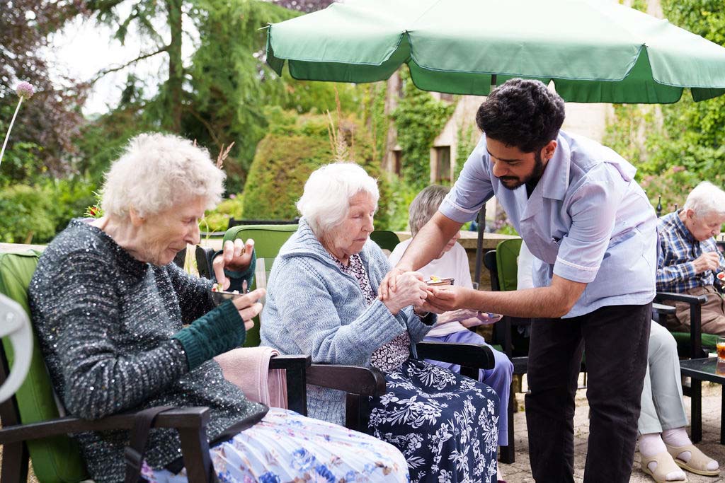 Elderly Lady with Carer